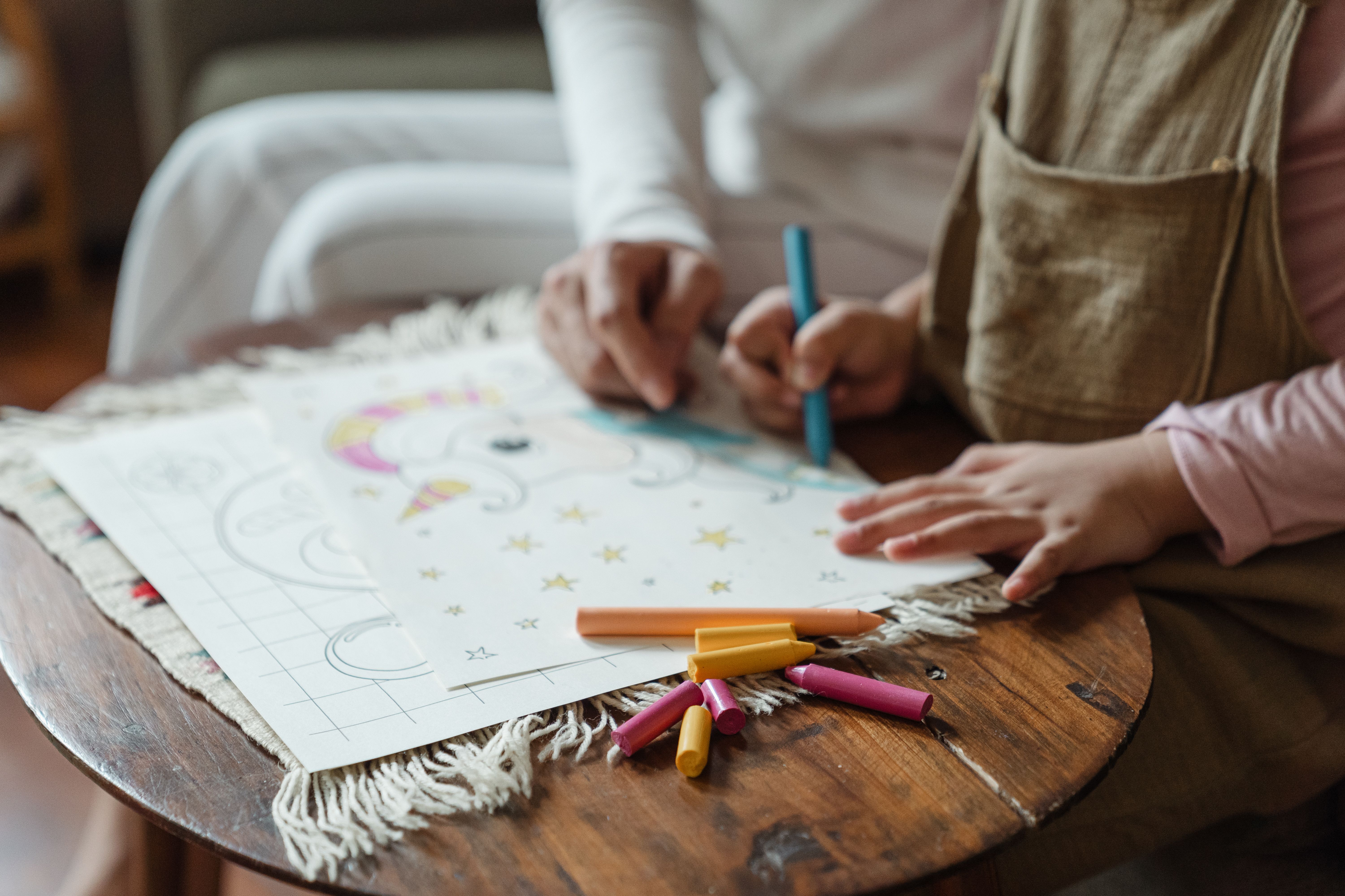 Parent and child enjoying coloring together